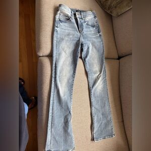 Like new express flared jeans. Never worn. Slit on side of flare